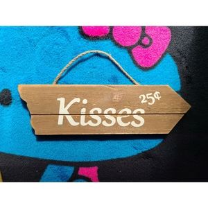 10" wooden "kisses 25cents" sign. Valentines day.